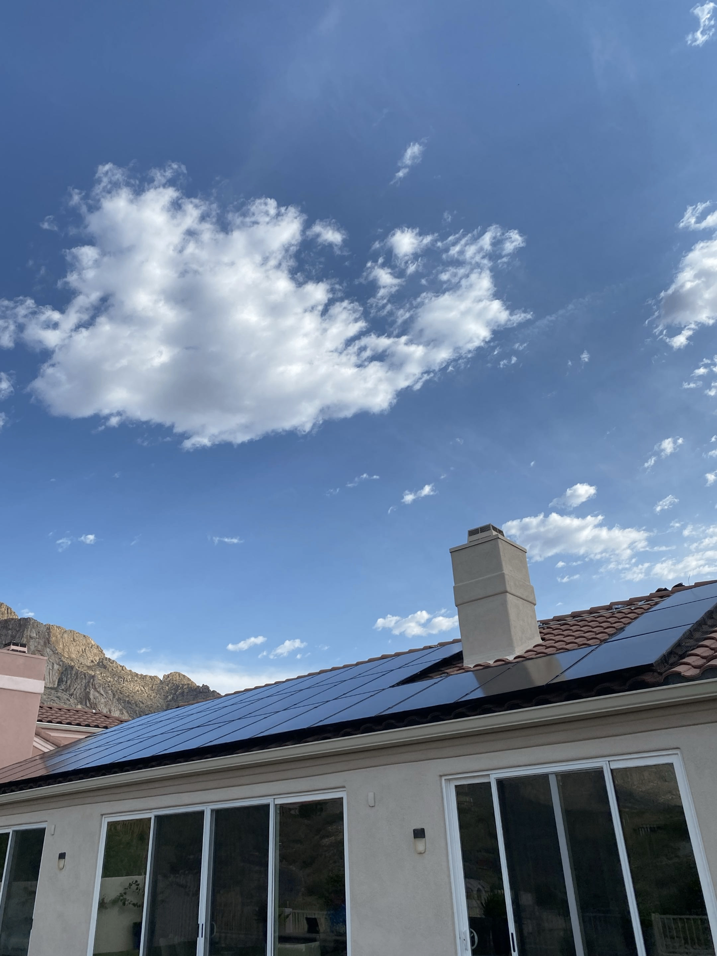 Solar panels on a sunlit rooftop